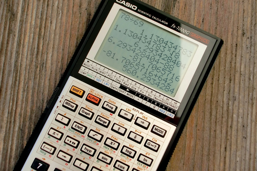 CASIO fx-7000G scientific calculator with graphics display, demonstrating complex mathematical computations, showcasing the efficiency of using Python numeric types for mathematical projects.