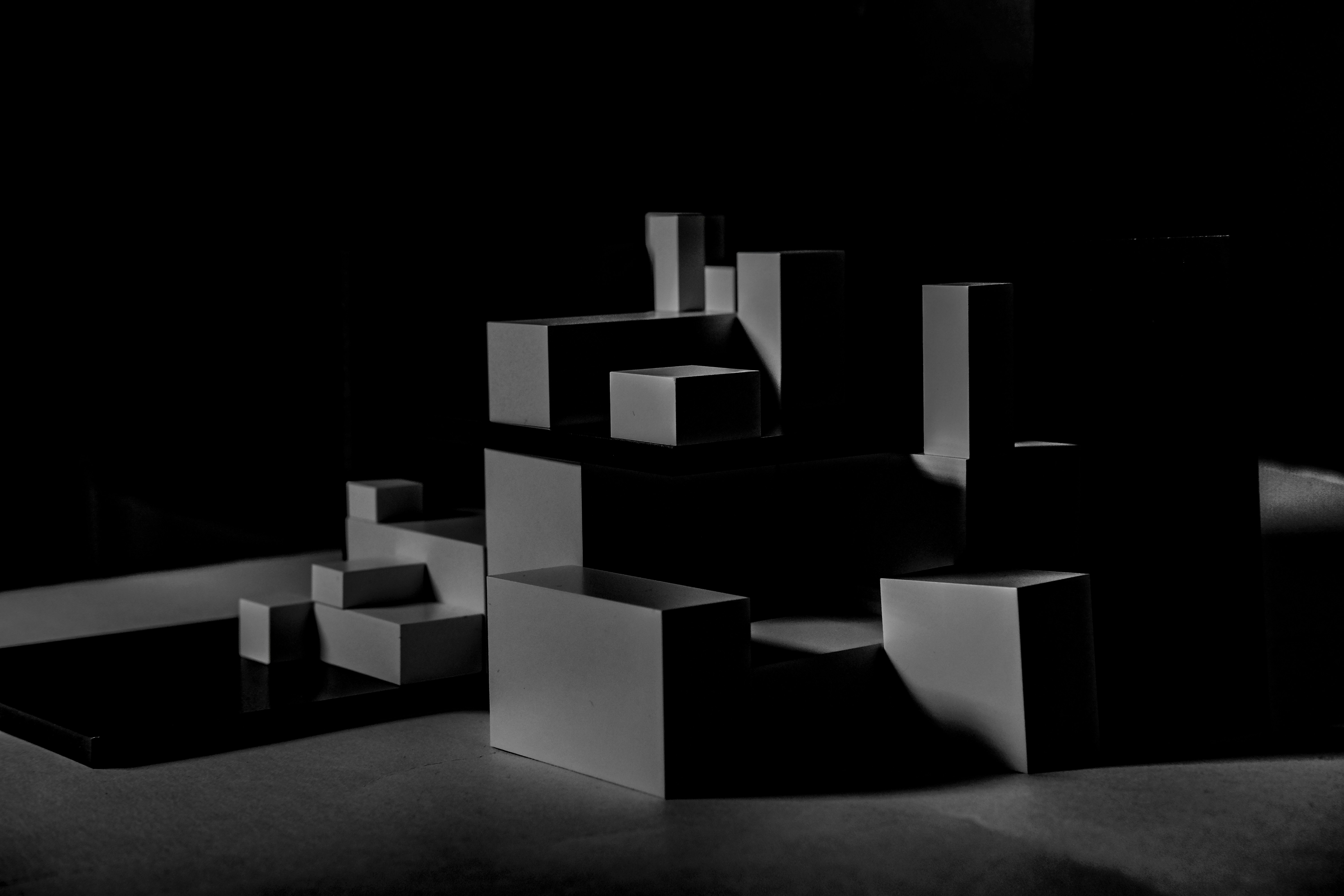 Abstract architectural structure illuminated with dramatic lighting, demonstrating principles of structural pattern matching in a Python programming context.